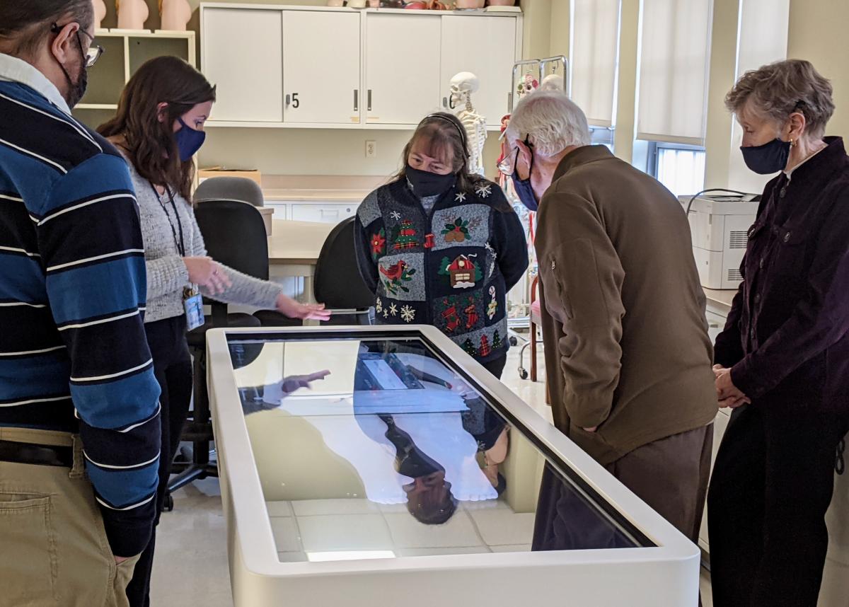 Decker family touring COPHS building